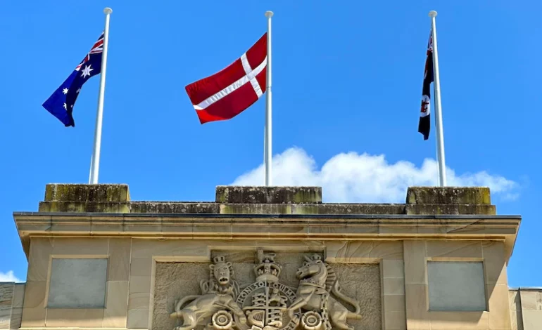 Tasmanian parliament takes down Aboriginal flag for Danish to celebrate Queen Mary, drawing criticism from Aboriginal community