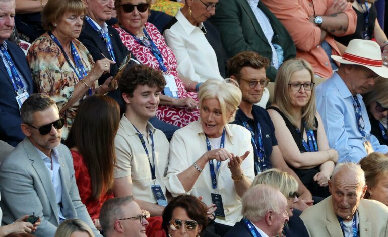 Identity of mystery young tennis fan sitting between Erica Bana and Deborra-Lee Furness at Australian Open revealed