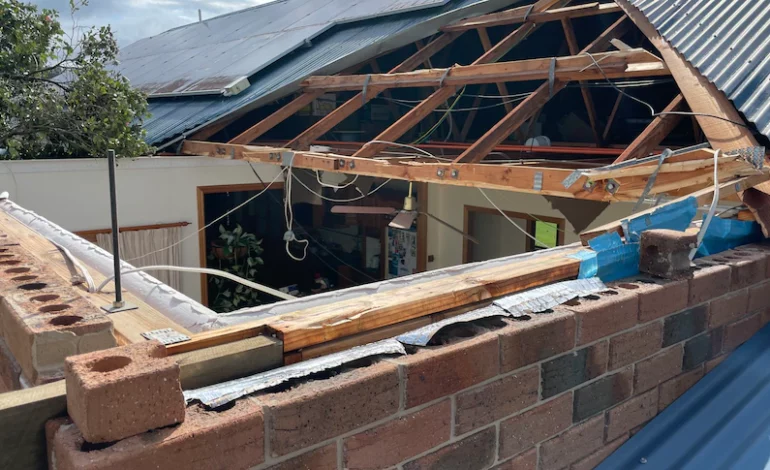 Repairs to storm and flood-damaged houses in Queensland face long delays due to tradie shortage