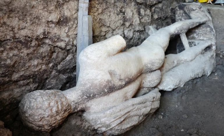 Archaeologists find marble god statue in ancient Roman sewer